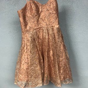 Teen girl peach sparkle dress.